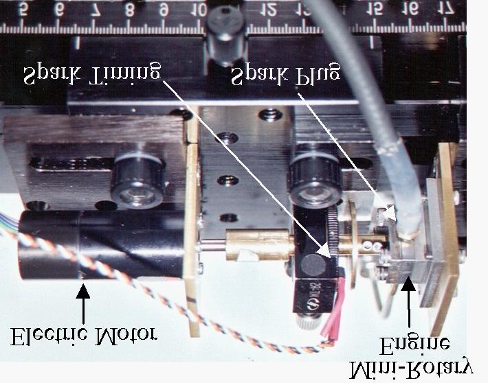 Fig. 1. UC Berkeley MEMS REPS research effort and scope. Fig. 2. 10 mm rotary engine. This engine is fabricated from steel using EDM techniques. Fig. 3. Mini-rotary engine test stand. Fig. 4.