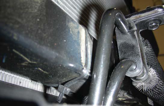 Place the slip nuts on the power steering cooler mounting points on the main receiver brace (Fig.C). 5.