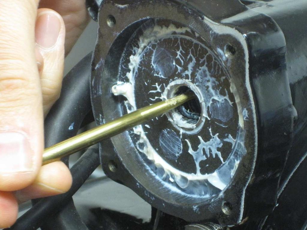11. Pull the gear shaft out of the monitor from the motor side.