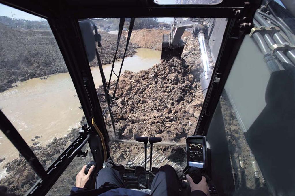 Expansive glass and clear sight lines provide outstanding all-around visibility with greater safety. Experience the adjustable, suspension seat and take command of the jobsite.