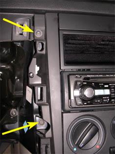 You should now be able to remove the trim cage from the dashboard. 60. If you need to swap the cupholder flap, follow the procedure corresponding to the type of cupholder that you have.