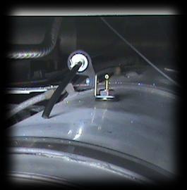 Slide pickup tube into fuel tank through hole, install with bottom washer then put on rubber seal and