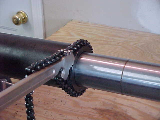 STEP 26- USING THE CHAIN WRENCH, TIGHTEN ROD GUIDE INTO CYLINDER.