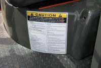04 INDICATIVE STICKER 216x250 ENGLISH 1 On top of the vertical face of the engine cover, easily readable before