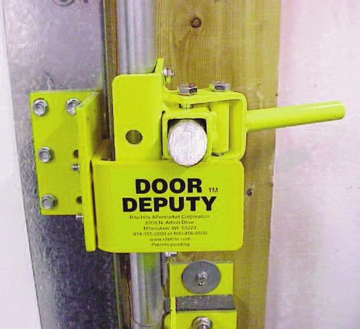 lock-down tm mechanism installation Continued 2. Lower the door completely.