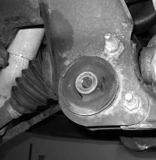 27. With the differential securely supported, remove the remaining bolts and lower the differential from the vehicle. 28.