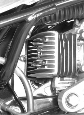 Disconnect the spark plug cap and remove the spark plug. ( 2-5) Remove the frame cover. ( 5-4 and 5-5) Remove the cylinder/cylinder head cover 1. Disconnect the spark plug cap.