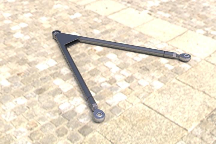 The push rod attaches at the base of the wheel upright, and travels diagonally upward to an attachment to a rocker.
