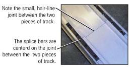 If the splice bars do not slide in easily, use the flat head screwdriver and the mallet to gently tap the splice bars into place.