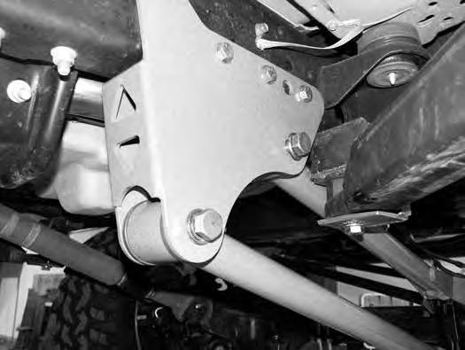 34. Install the assembled upper control arm in the new frame bracket and fasten with a ¾ x 5-1/2 bolt, nut and ¾ SAE flat washers from bolt pack #432.