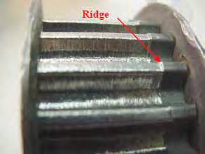 A good indication of sprocket wear is when a ridge along the tip of sprocket teeth becomes visible, Use caution: severely worn surfaces on sprocket faces may become very sharp.