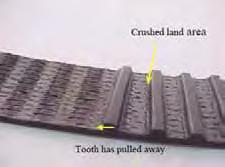 Belts subjected to significant cyclic peak tensions exhibit land areas with a crushed appearance.