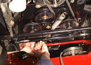 ENGINE 17. Remove the mower drive belt from the electric PTO clutch, refer to Replacing the Mower Deck Drive Belt page x-xx. 20.
