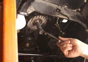 Remove the 4 engine mounting bolts and washers (Fig. 312).