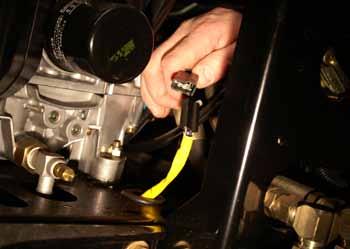 ENGINE 10. Unplug the electric PTO clutch plug (Fig. 342). 12. Remove the fuel hose clamp on the fuel hose located at the fuel pump (Fig. 344). Fig 342 PICT-0405 Fig 344 PICT-0407 11.