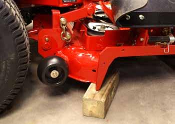 MOWER DECKS/PTO 4. Remove the belt from the electric PTO clutch (Fig. 442). 6. Remove the four sets of bolts, spacers and washers holding the front and rear lift chains to the mower deck (Fig. 444).
