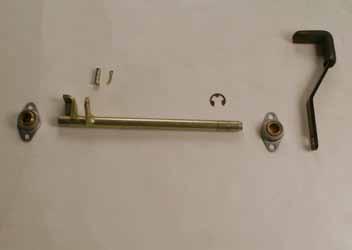 Remove the cotter pin and clevis pin holding the brake rod assembly to the