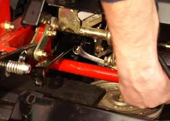 Inspect the deck lift lever assembly components for wear, especially the