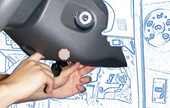 Insert fingers into the opening of the Tilt Lever of the Steering Column Under Cover to