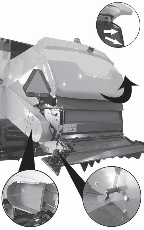 The rear guard of the chopper, fig. B3, (straw spreader) is released by opening the side locks on both sides of the combine. The guard gets locked in the upper position.