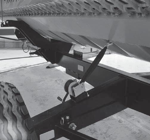The trailer is equipped with a winch, which can be used to pull the trailer to the combine hook after the combine has been reversed near the trailer.