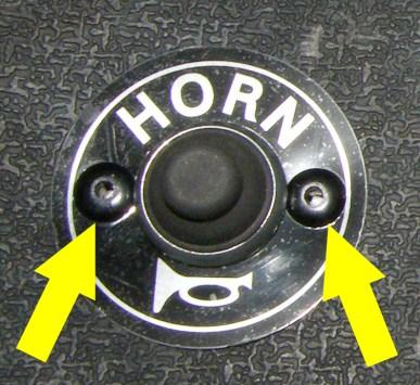 Connect the (2) ring terminals from the horn harness to the back of the horn button.