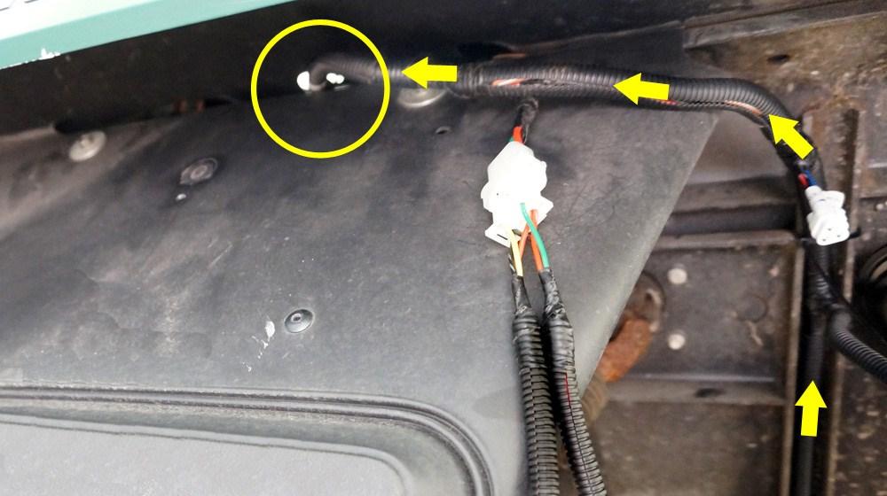 Remove the two rivets on the key switch plate and remove the plate to access the dash compartment.