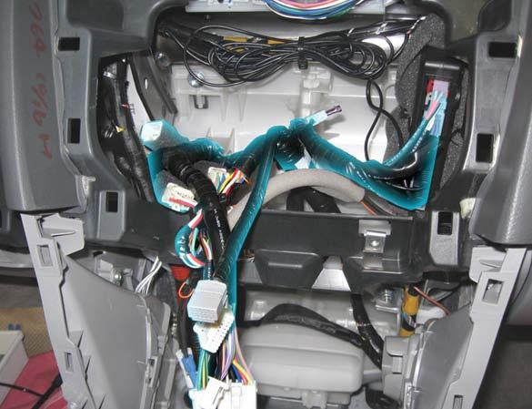 Cut of excess wire ties. 4. Connect the main power harness to the matching vehicle s radio harness (Fig 1-33). Fig. 1-32 NOTE: AVC-LAN (12 pin) connector may not be present on the vehicle s harness.