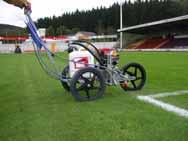 Execute marking jobs on sports areas with lawn or artificial