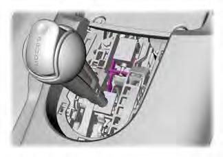 Use the brake shift interlock lever to move the gearshift lever from the park position in the event of an electrical malfunction or if your vehicle has a dead battery.
