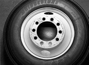 Lubricate the wheel bead seat using vegetable oil-based lubricant approved for both tire