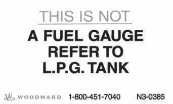 Fuel Gauge" circular label N3-0385 "This Is