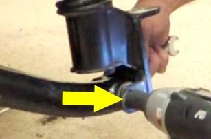 A rubber mallet can be used to align the A-arm in the mounting tabs. 19.