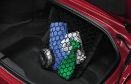 With it, the action of flexible netting keeps your top shelf belongings firmly in place in the centre console.