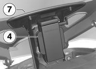 Operate latch 3, pull the navigation device forward out of holder 6 and lift it up and out.