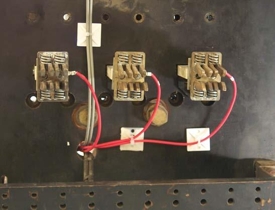 PT Wires Connected to the Bottom Breaker Stabs. D. Use the self-adhesive mounting pads and wire ties supplied to secure the PT Wires to the Breaker Backplate.