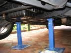 Car Stands A portable hand positioned device for supporting car chassis