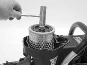 A Guide carburetor compensating tube through air filter mount. Make sure manifold sits flat over lip on cylinder cover.