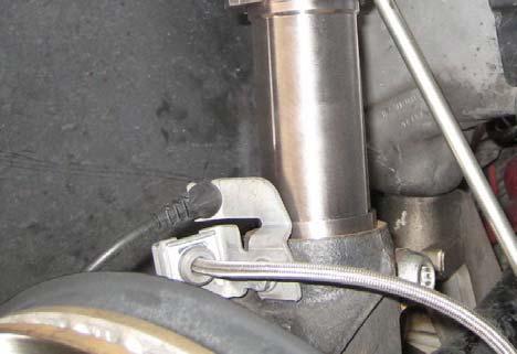 Secure the tie rod to the hub using the OE nut. Photo 13 25.