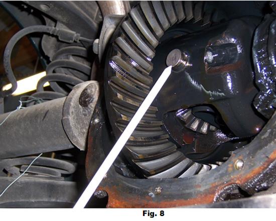 10. Rotate the differential and push both axle shafts in,