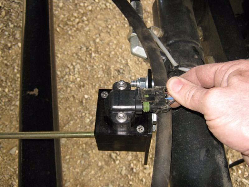 Attach the SA Module Harness Wheel Angle Sensor connector to the Wheel Angle Sensor.