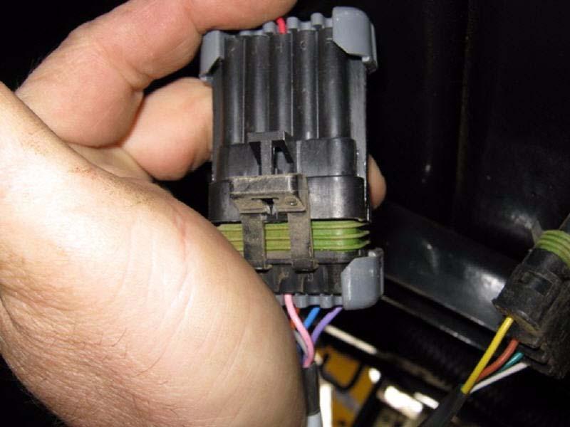 connector. See Figure 6-9. Figure 6-9 Connecting Steering Valve Adapter Cable To Factory Connector 4.