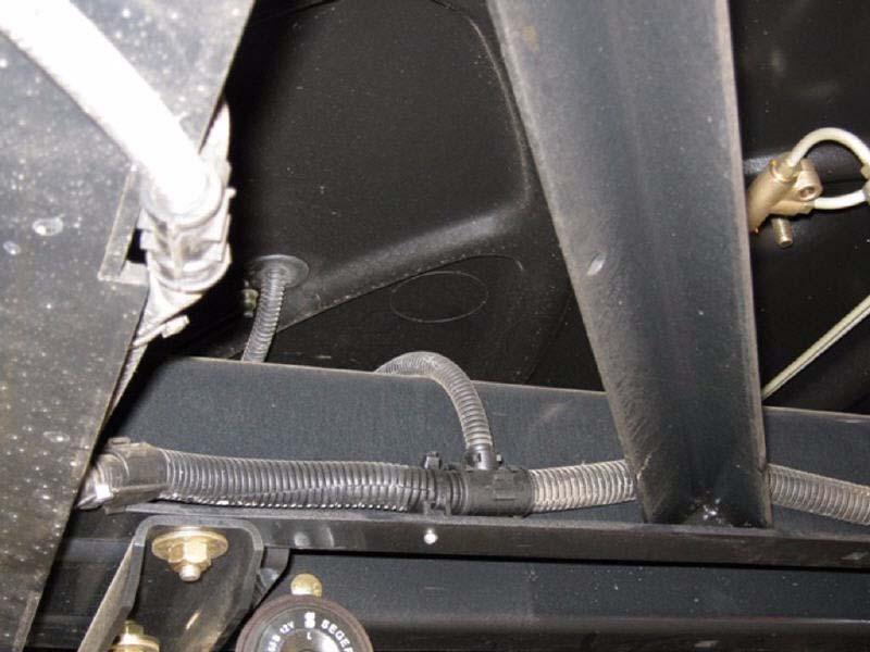 Figure 6-18 Cab Floor Main cable Harness Feedthrough Location Cab Floor Feedthrough Location 2.