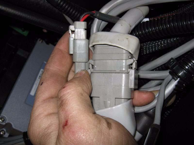 Attach the two SA Module Harness connectors to the Main Harness. See Figure 6-23.
