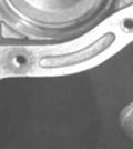2) Tighten band adjusting screw to