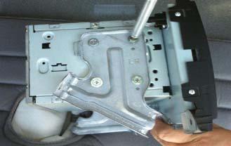 Phillips screws to release dash/vent trim from OEM radio.