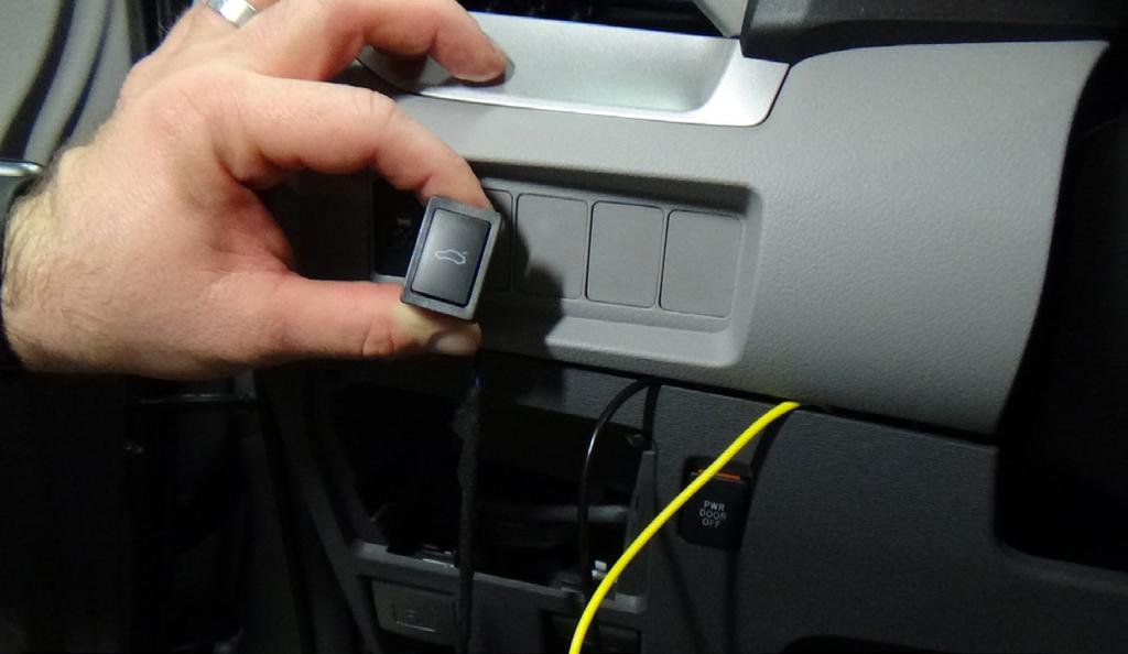Using a moulding remover, remove the driver's side under dash side panel as pictured. 19.