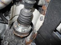 35) Reinstall the two bolts into the transmission dog bone brace.