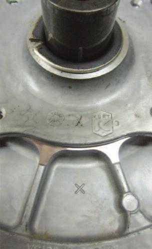 In a star pattern, tighten each bolt a little at a time until the cap is seated against movable sheave of clutch. Torque cap bolts evenly to 100 in/lbs. (12 Nm).