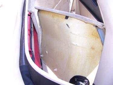 Remove the rear compartment side trim panel take a look at the photo below first, showing how the panel is fastened.